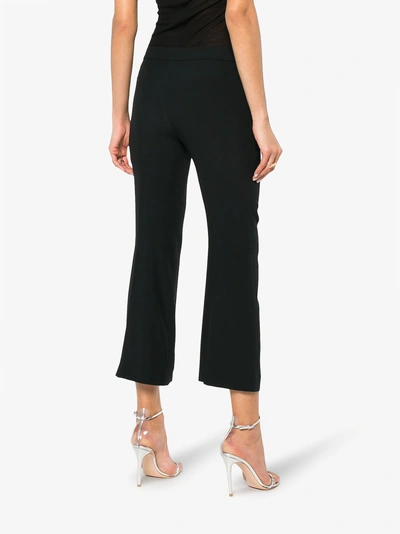 Shop Alexander Mcqueen Kick-flare Cropped Trousers In Black