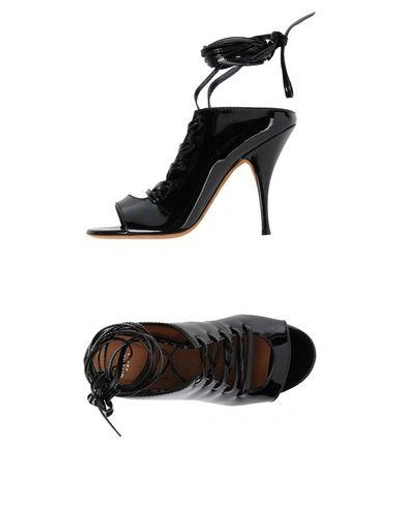 Shop Givenchy Sandals In Black