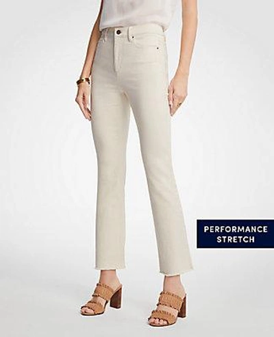 Shop Ann Taylor Raw Hem Flare Crop Jeans In Whitecap