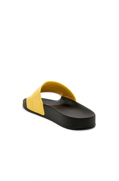 Shop Adidas Originals Adidas By Raf Simons Adilette Checkerboard In Yellow