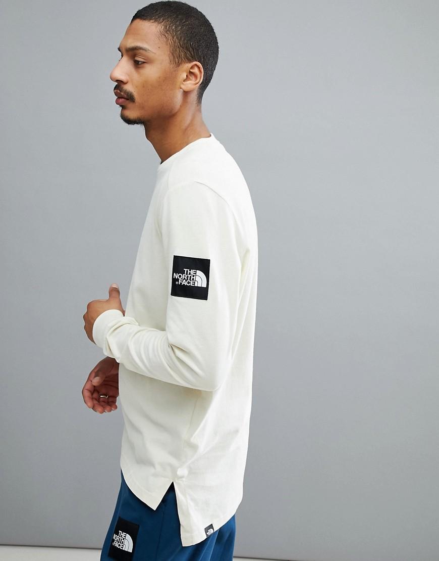 white long sleeve north face top