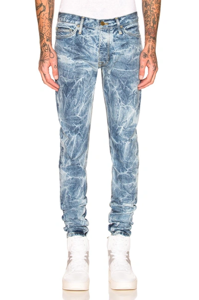 Shop Fear Of God Selvedge Denim Holy Water Jeans In Blue,ombre & Tie Dye