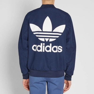 Shop Adidas Originals Adidas Reversible Pastel Camo Bomber Jacket In Blue