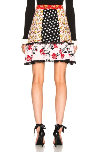 Shop Alexander Mcqueen Floral Peplum Mini Skirt In Floral,pink