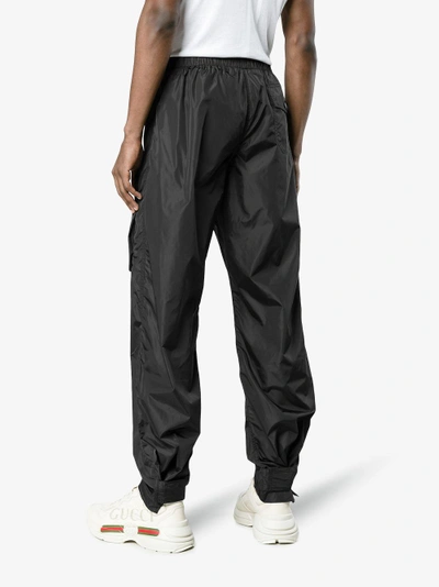 Shop Givenchy Shell Track Trousers In Black