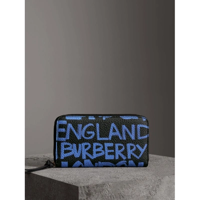 Shop Burberry Graffiti Print Leather Ziparound Wallet In Blue/black