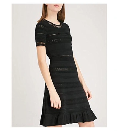 Shop Sandro Ribbed-knit Dress In Noir