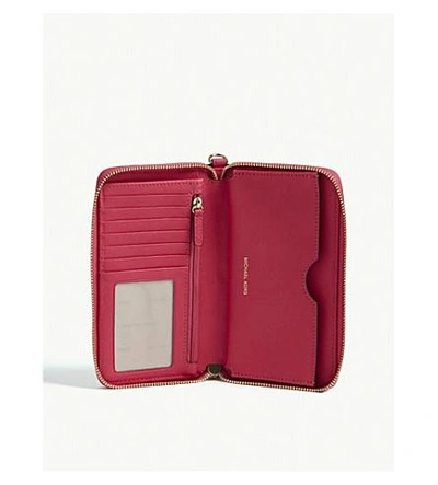 Shop Michael Michael Kors Leather Wristlet In Ultra Pink