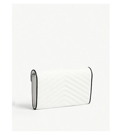 Shop Saint Laurent Monogram Quilted Leather Wallet-on-chain In White/black