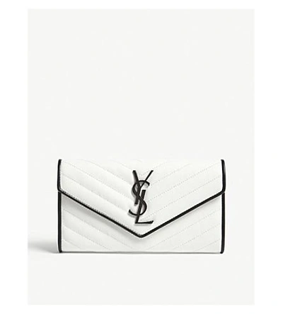Shop Saint Laurent Monogram Quilted Pebbled Leather Wallet In White/black