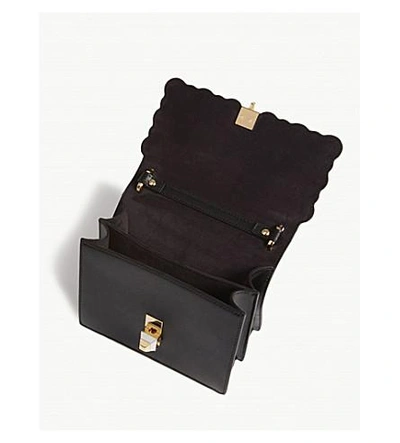 Shop Fendi Kan I Studded Leather Cross-body Bag In Black