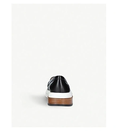Shop Tod's Gomma Travers Leather Loafers In Black