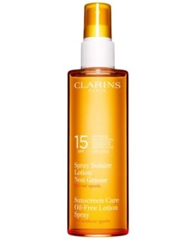 Shop Clarins Sunscreen Oil-free Lotion Spray Spf 15, 5.1 Fl. Oz.