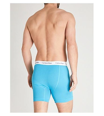 Shop Calvin Klein Pack Of Three Slim-fit Stretch-cotton Trunks In Blu Teal Red