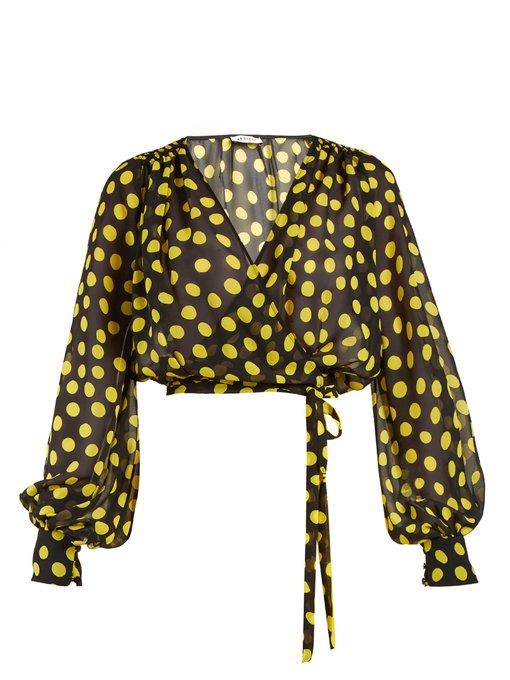 yellow and black polka dot shirt