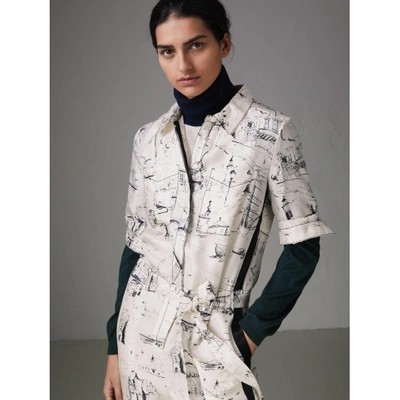 Shop Burberry Landmark Print Silk Jumpsuit In Off White/black