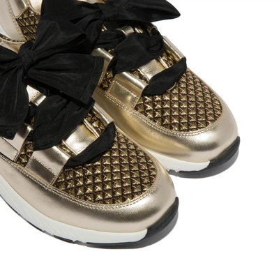 Shop Casadei Runners In Gold And Black