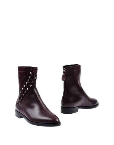 Shop Alaïa Ankle Boot In Maroon