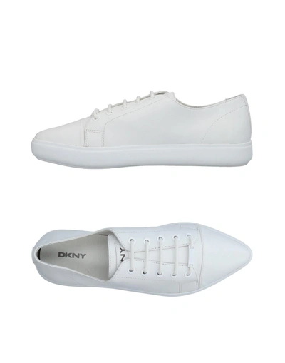 Shop Dkny Sneakers In White