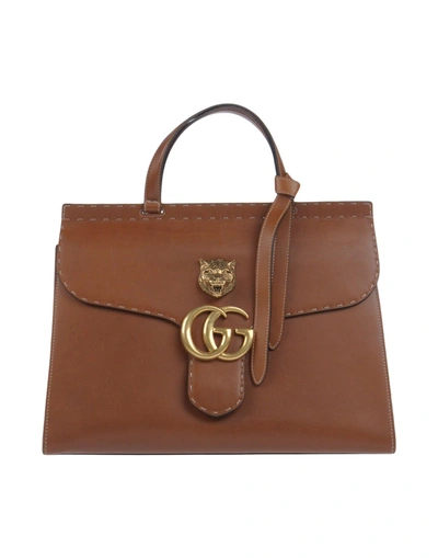 Shop Gucci Handbag In Brown