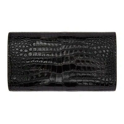 Shop Saint Laurent Black Croc Large Flap Monogram Wallet