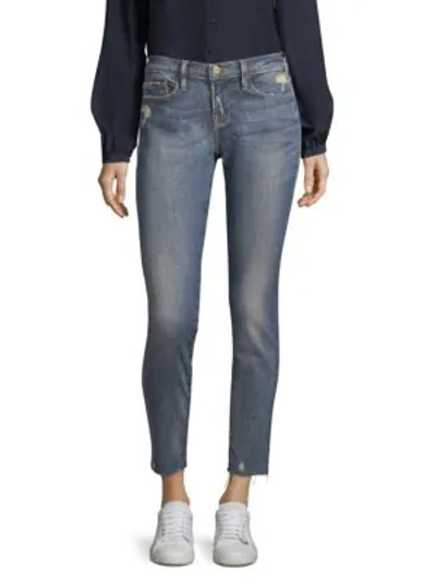 Shop Frame Le Skinny Jeanne Frayed Hem Jeans In Victoria Park