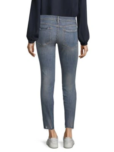 Shop Frame Le Skinny Jeanne Frayed Hem Jeans In Victoria Park