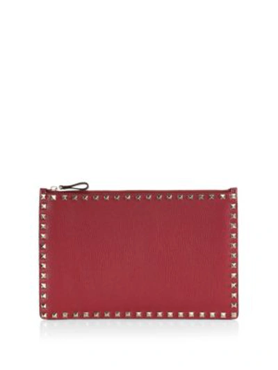 Shop Valentino Large Rockstud Leather Pouch In Dark Red