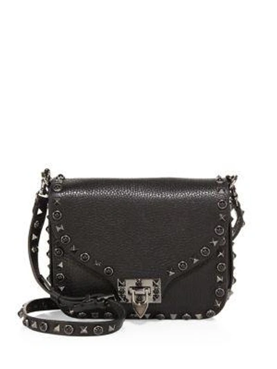 Shop Valentino Rolling Rockstud Embellished Leather Shoulder Bag In Black