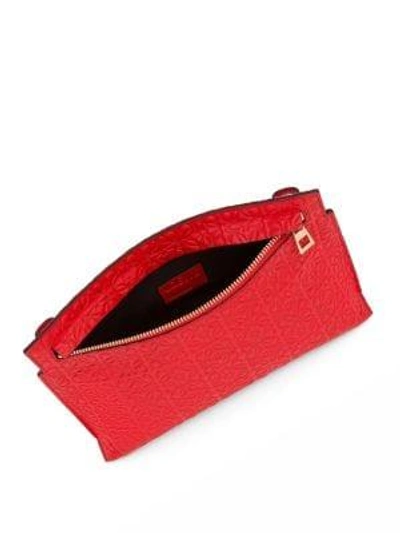 Shop Loewe Logo-embossed Leather Crossbody Pouch In Red