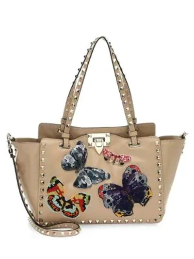 Shop Valentino Small Rockstud Butterfly Leather Tote In Camel