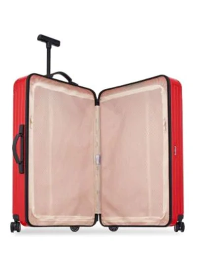 Shop Rimowa Multi-wheel Roller Suitcase In Guards Red