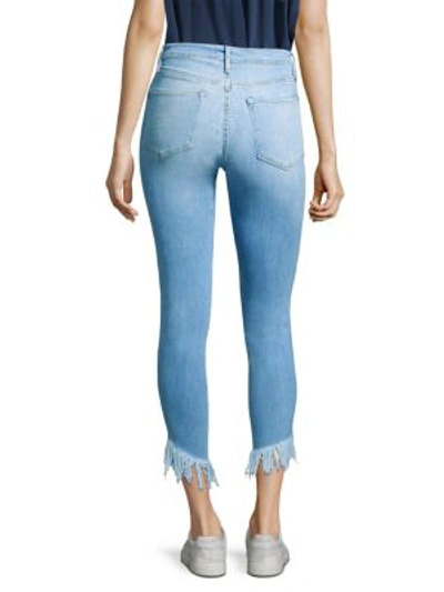 Shop Frame Le High Skinny Shredded Hem Jeans In Eling