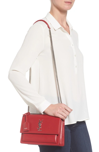Shop Saint Laurent Medium Sunset Calfskin Leather Shoulder Bag In Rouge Lipstick