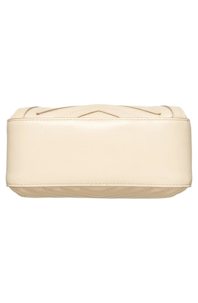 Shop Stella Mccartney Mini Star Quilted Faux Leather Camera Bag - Ivory In Cream