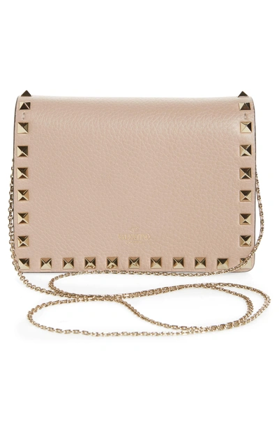 Shop Valentino Rockstud Leather Pouch Wallet On A Chain In Poudre