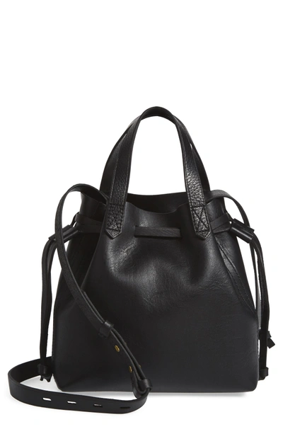 Shop Madewell The Mini Pocket Transport Leather Drawstring Tote - Black In True Black