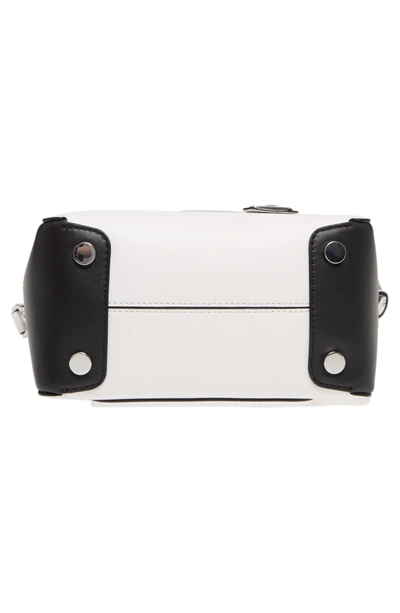 Shop Michael Kors Mini Leather Messenger Bag - White In Optic White/ Black