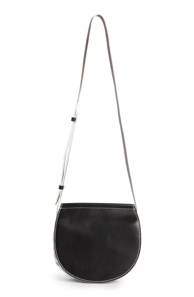 Shop Givenchy Mini Infinity Calfskin Saddle Bag - Black In Black/ White