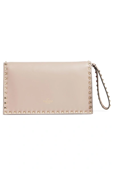 Shop Valentino Rockstud Calfskin Leather Clutch - Pink In Poudre