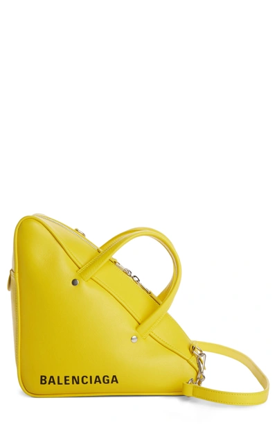 Shop Balenciaga Small Triangle Duffel Bag - Yellow In Jaune