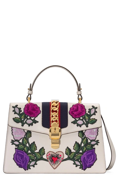 Shop Gucci Medium Sylvie Floral Patch Top Handle Leather Shoulder Bag - White In Mystic White/ Blue/ Red