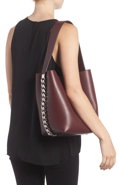 Shop Givenchy Infinity Calfskin Leather Bucket Bag - Red In Oxblood
