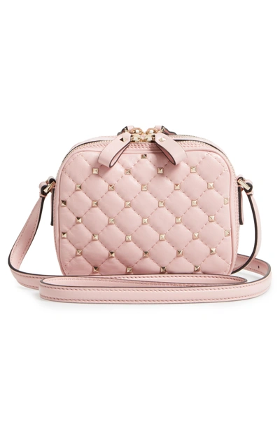 Shop Valentino Rockstud Leather Camera Crossbody Bag - Pink