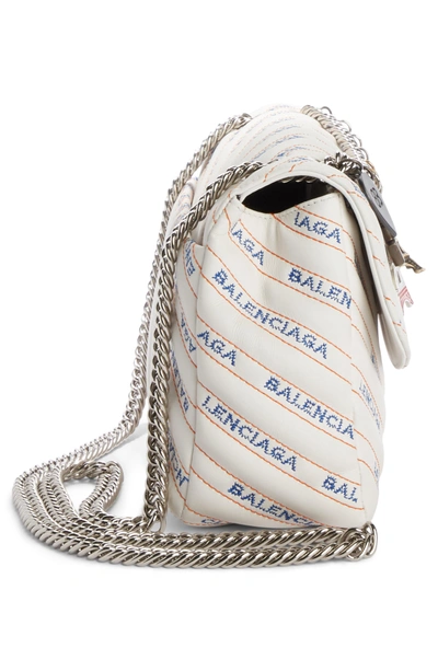 Shop Balenciaga Medium Bb Round Logo Charm Crossbody Bag - White In Blanc/ Bleu/ Orange