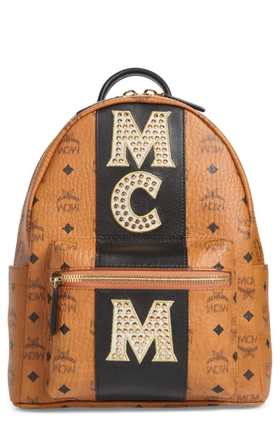 Shop Mcm Stark Stripe Studs Coated Canvas Backpack - Brown In Cognac