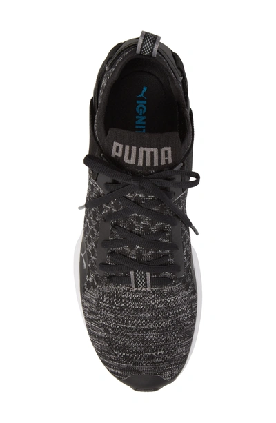 Shop Puma Ignite Evoknit Lo Training Shoe In Black/ Blue