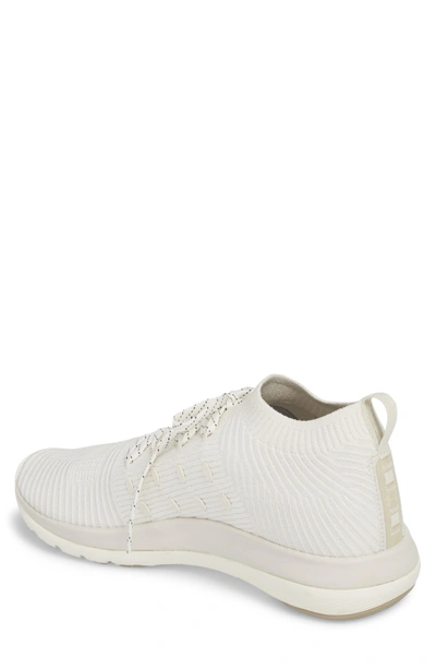 Shop Under Armour Slingflex Rise Sneaker In Ivory/ Metallic Victory Gold