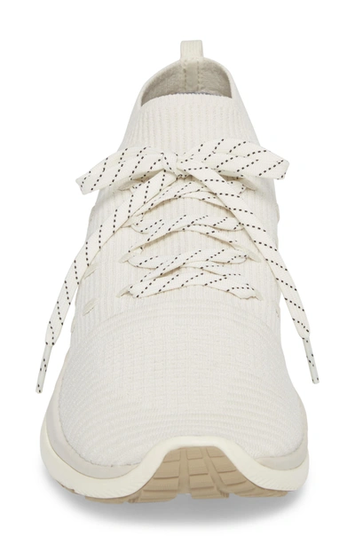 Shop Under Armour Slingflex Rise Sneaker In Ivory/ Metallic Victory Gold