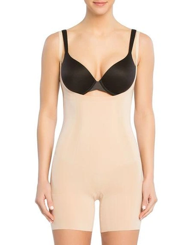 Shop Spanx Oncore Open-bust Mid-thigh Bodysuit Shaper In Soft Nude
